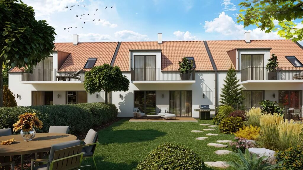 3D vizualizace útulného venkovního posezení na zahradě moderního domu, obklopeného vysokými okrasnými trávami a kvetoucími rostlinami.